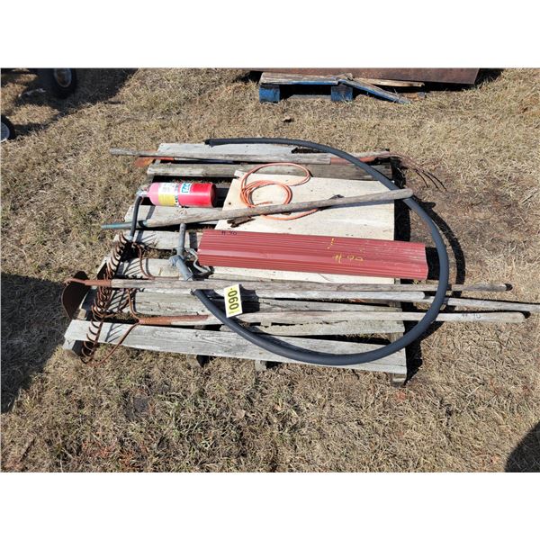 Pallet of misc. rakes, back hoe, fire ext., pump hose etc.