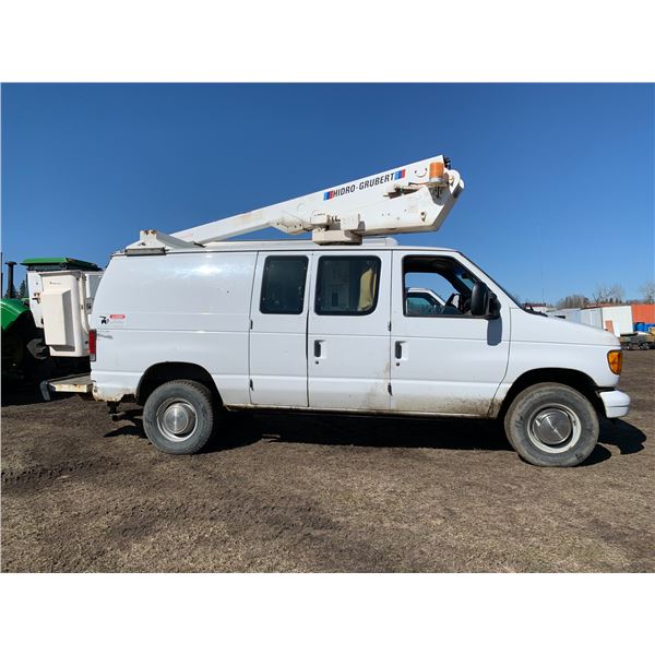 2003 Ford Econoline white Van, gas, showing 87,655 miles, c/w Hidro-Grubert man lift, in working ord