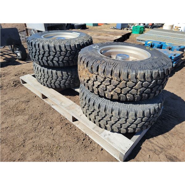 (So much each x 4) 4- Nokia Tires LT 285/70R17s c/w Dodge 8-hole mag wheels