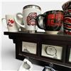Image 3 : Wall Shelf with Assorted First Nations Design Cups, Mugs and Trucker Hats (Shelf is 23" long)