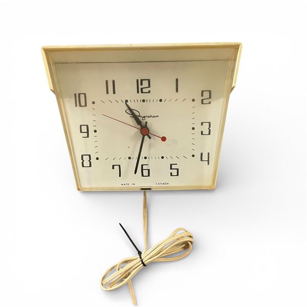 This Item is a Vintage Electric Wall Clock, Likely Manufactured by Ingraham