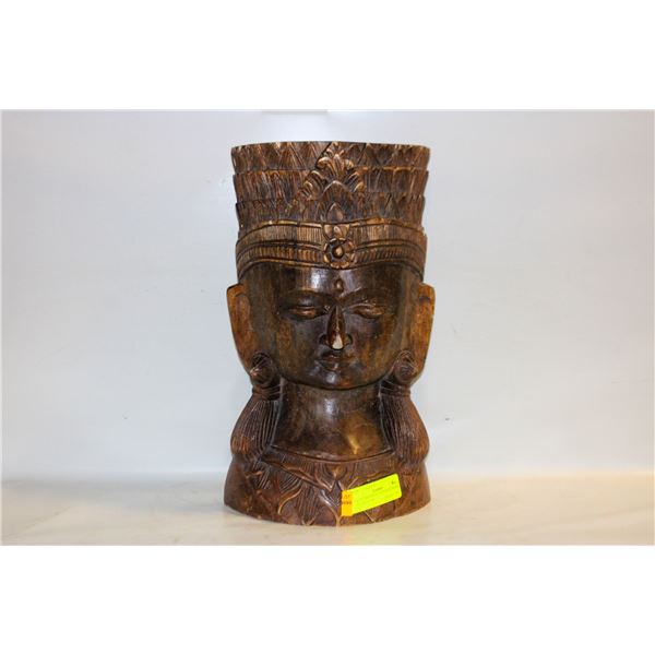 OLD CARVING OF A WOMAN MARK ON THE NOSE