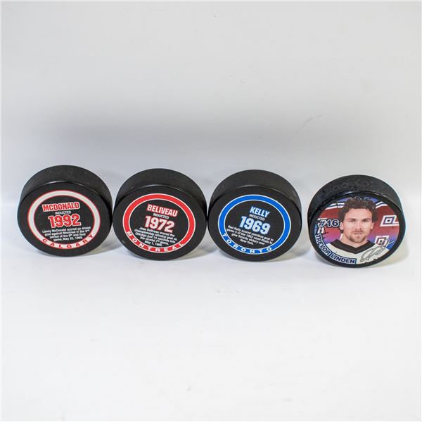 VINTAGE LOT OF 4 HOCKEY PUCKS