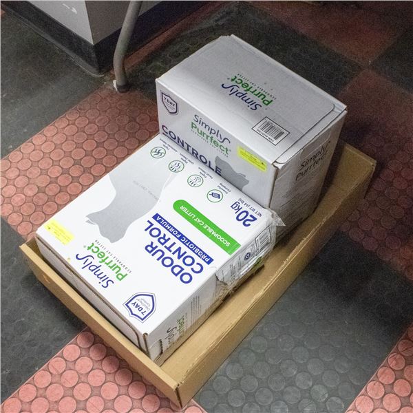 TWO BOXES OF CAT LITTER - BOTH ARE LEAKING