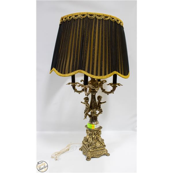 VINTAGE BRASS LAMP WITH CHERUBS IN CANDLE STICK