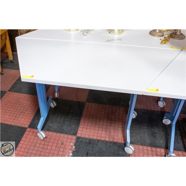 WORKSHOP TABLE ON CASTORS H-29" W-25.5" L-60"