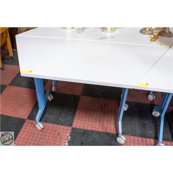 WORKSHOP TABLE ON CASTORS H-29" W-25.5" L-60"