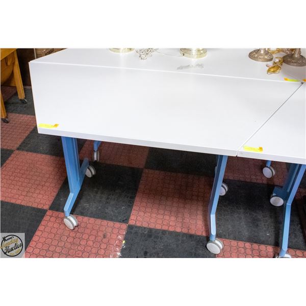 WORKSHOP TABLE ON CASTORS H-29" W-25.5" L-60"