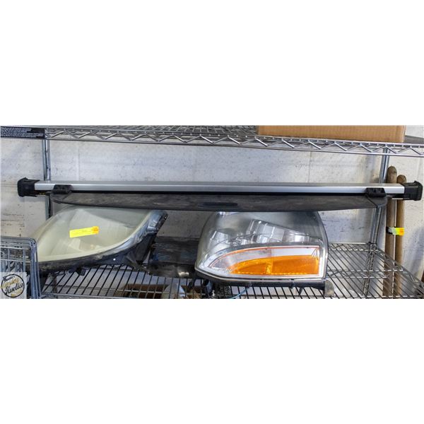 AUTOMOTIVE LOT INCLUDING UNUSED TRUCK