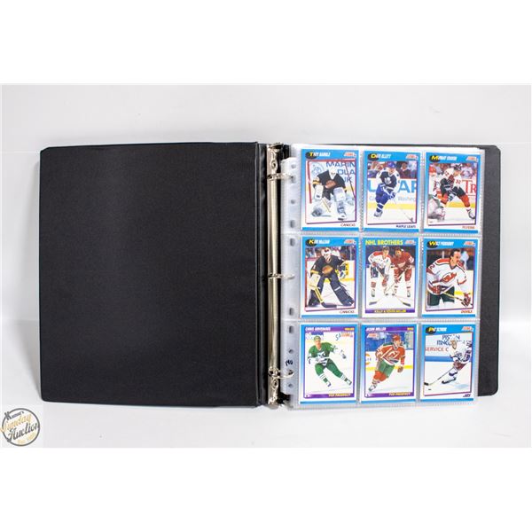 BINDER WITH 140 HOCKEY CARDS