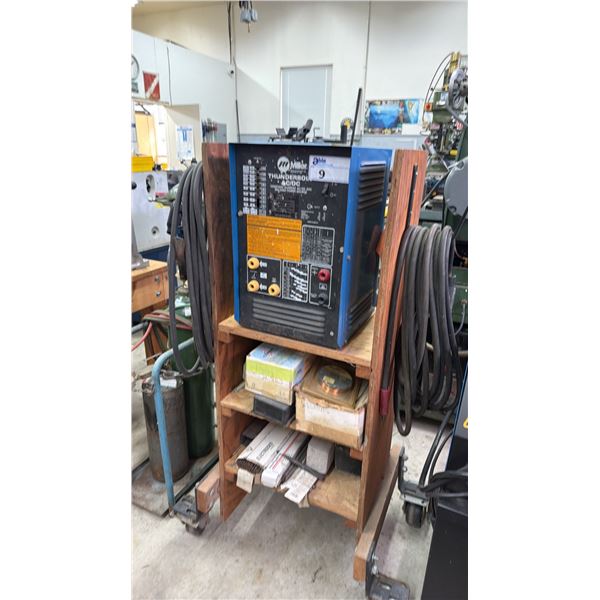 MILLER THUNDERBOLT AC/DC CONSTANT CURRENT AC/DC ARC WELDING POWER SOURCE ON PORTABLE WOOD WELDING