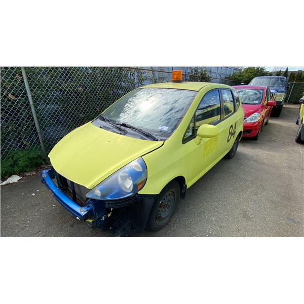 2007 HONDA FIT, 4DR HATCHBACK, YELLOW, VIN JHMGD38207S815029,