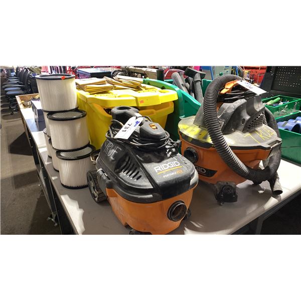 2 SMALL RIDGID PORTABLE SHOP VACS WITH ASSORTED FILTERS & ATTACHMENTS  *1 HAS HOSE*