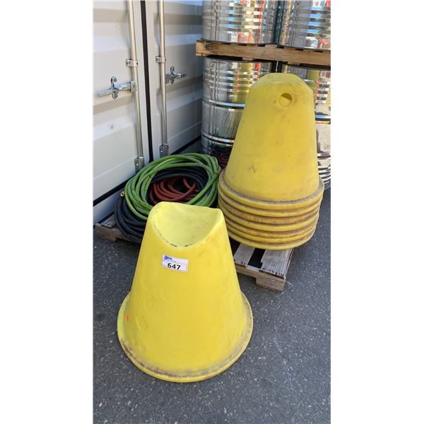 HEAVY YELLOW PLASTIC PIPE STAND CONES WITH ASSORTED WATER LINE HOSE
