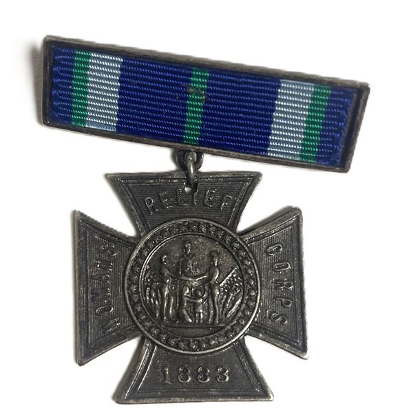 Women's Relief Corps, specifically a membership medal for a color bearer, dated 1883.