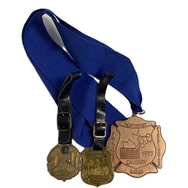 commemorative awards from the 1993 Northwest Police Games held in Calgary.