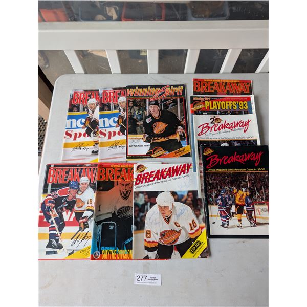 Lot of 10 Canucks Magazines Most Signed and poster of Luc Robitaille