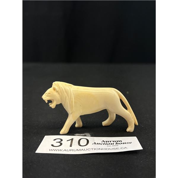 A Carved African Ivory Lion (Nice Item)