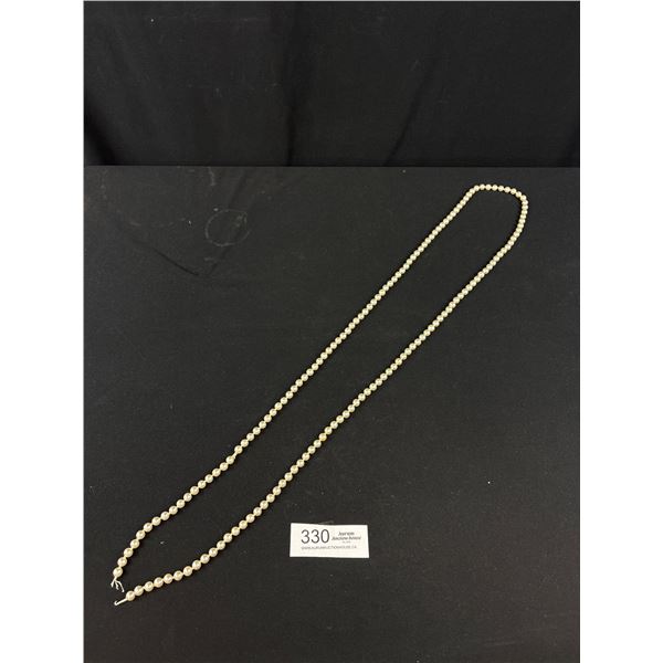 A Huge 56" Long Strand of Quality Faux Pearls (No Catch)