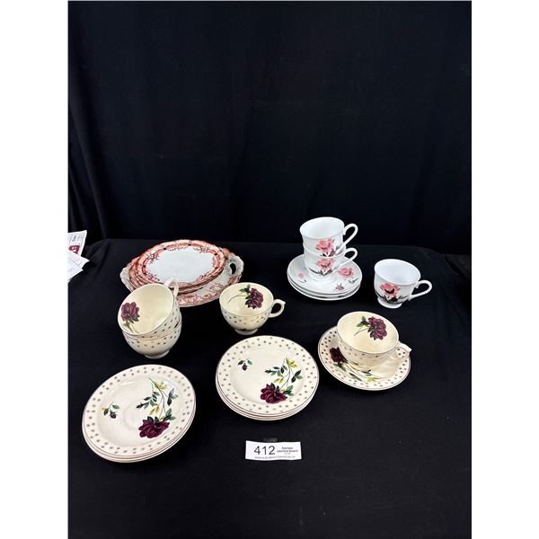 Lot of vintage bone china teacups and saucers plus sideplates and serving