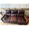 Image 1 : Large Brown Leather Sofa With Wooden Handles. (Length 80"  -  Breadth 39"  -  Height 41") (Excellent