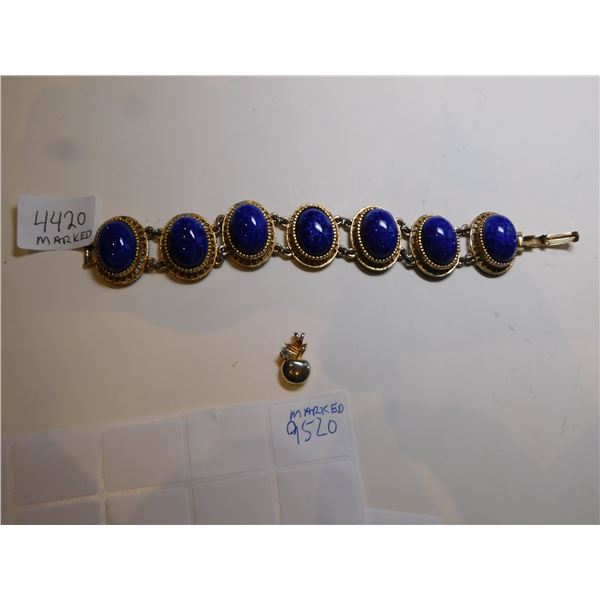 GOLD TONED BLUE STONE 4420 AND 9520 PENDANT