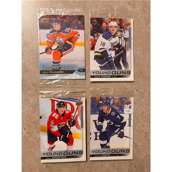 Assortment of Oversized Young Guns Hockey Cards (4)
