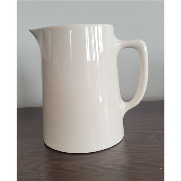 6 1/2" tall x 4" wide - cream pottery pitcher