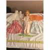 Image 4 : Vintage doll with dresses in good condition