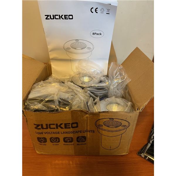 Landscape lights (8). New. Never used. Missing the transformer.