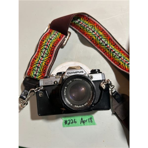 Olympus OM10 35mm camera with Wolf brand case, flash attachment, original  invoice