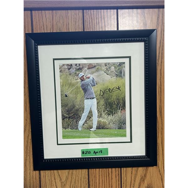 Framed, autographed picture of Sask. golfer Graham DeLaet (frame 16” x 14.5”)