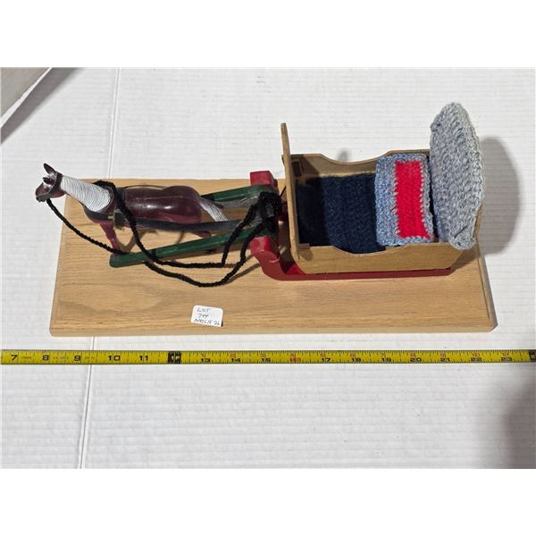 Hand crafted sleigh with horse