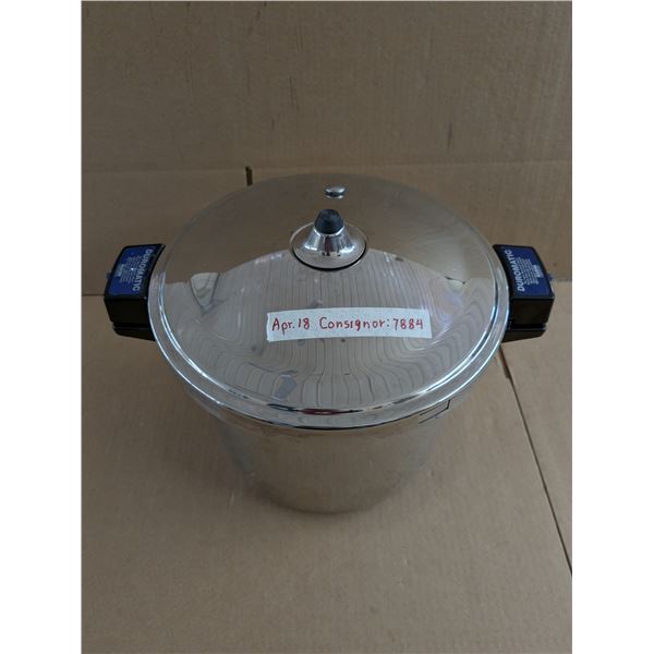 DUROMATIC Pressure Cooker; works well. Two recipe books included.