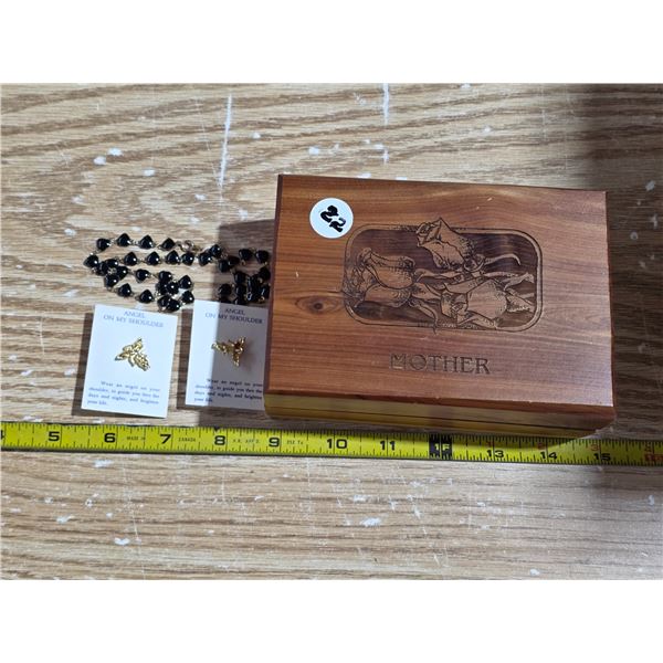 Jewelry box with heart shaped necklace and 2 angel on shoulder earrings