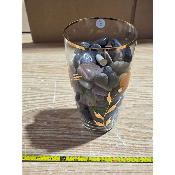 Vase filled with polished rocks