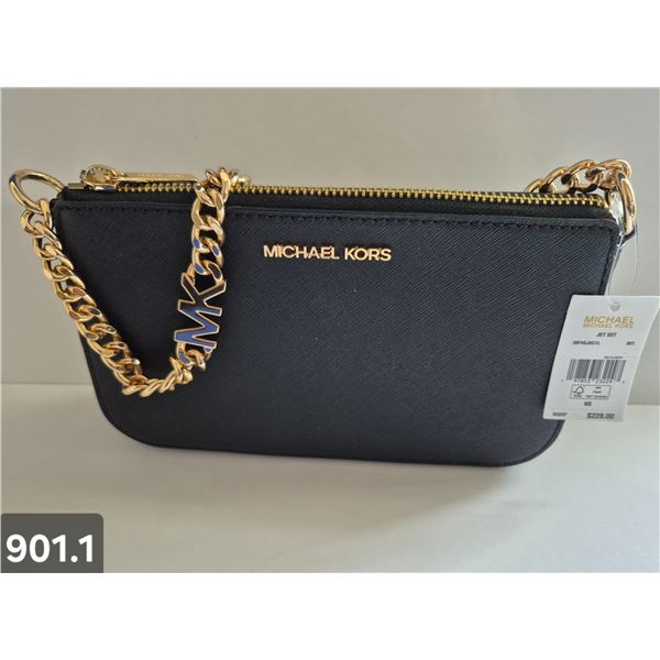 901. Authentic New Michael Kors purse with original tags
