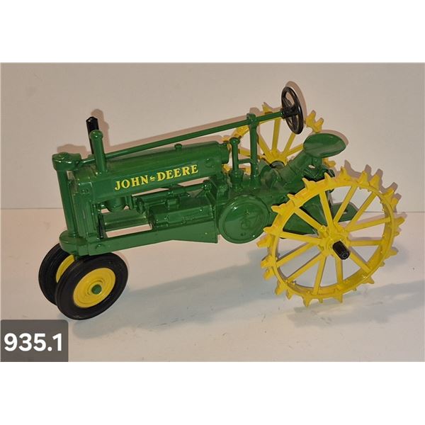 935. Ertl John Deere tractor with steel wheels - mint condition, from the 80s or 90s, 8 1/2 inches. 