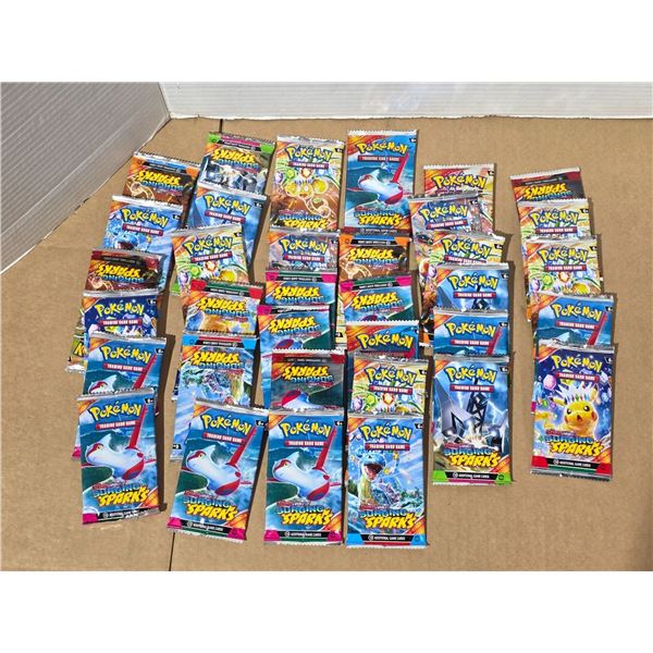 35 packs of surging sparks pokemon booster packs