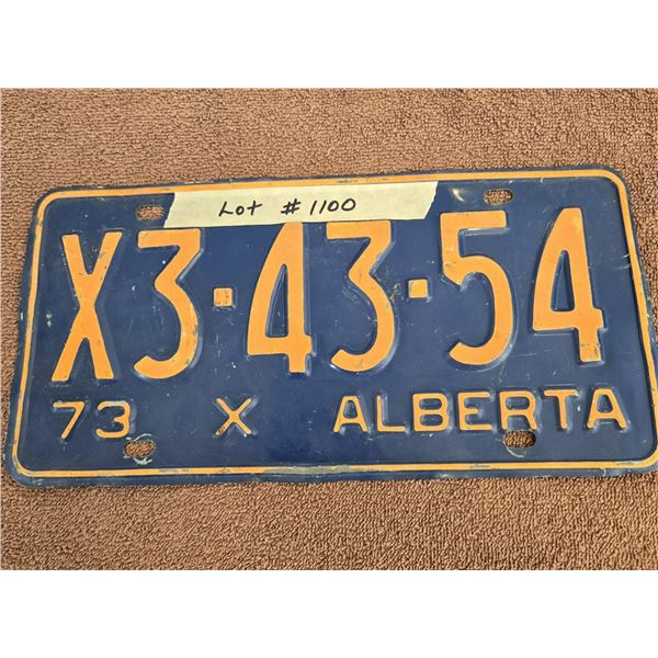 1100 - 1973 Alberta "X" licence plate. X states an exempt status.