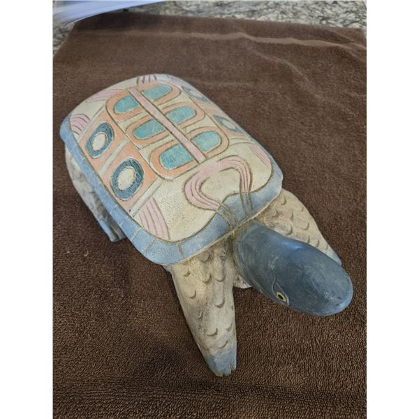 1106 - Hand carved and painted wooden sea tuetle sculpture.  Painted details on the shell.  12" x 6"