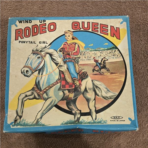 1110 - Vintage "Rodeo Queen Ponytail Girl" wind-up tin toy in original box.  Manufactured in Japan b