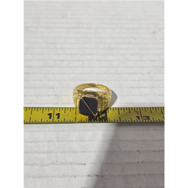 Gold colored ring - size 10