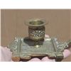 Image 3 : Vintage brass candlestick features a distinct square base with intricate detailing and an oval medal