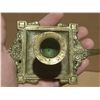 Image 4 : Vintage brass candlestick features a distinct square base with intricate detailing and an oval medal