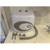 Image 1 : NEW WATER HEATER, 4 GALLON 110/120V PLUG IN, INCLUDES INSTALL HARDWARE