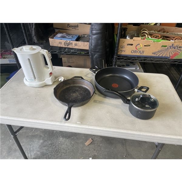 CAST IRON PAN, ELECTRIC KETTLE, AND POT AND PAN