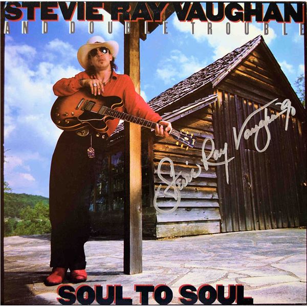 Stevie Ray Vaughan and Double Soul To Soul signed album