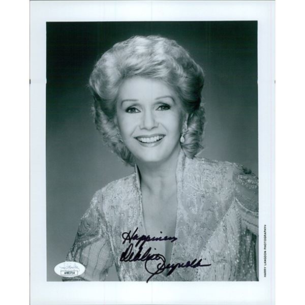 Singin In The Rain Debbie Reynolds signed photo. JSA Authenticated
