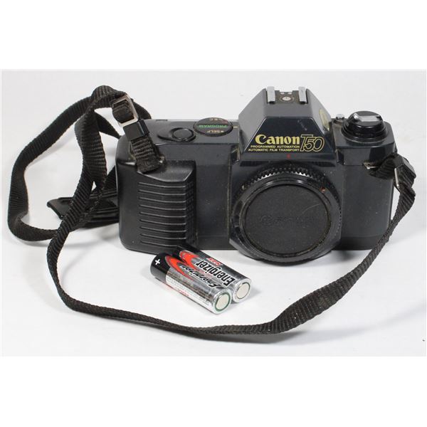 CANON T50 CAMERA  TURNS ON. NO LENS